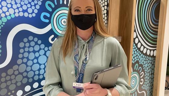 An authorised officer wearing a mask and ready to visit an education and care service